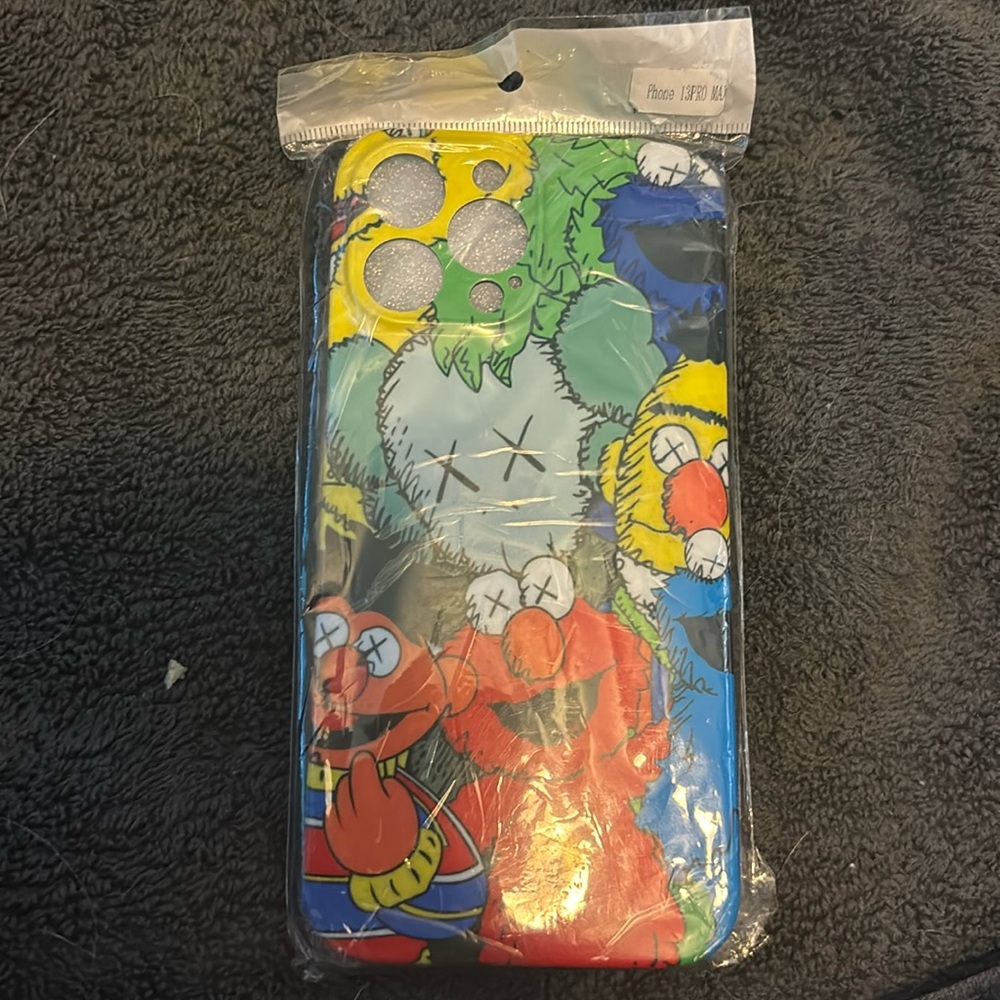 iPhone 13 Pro Max phone with lanyard